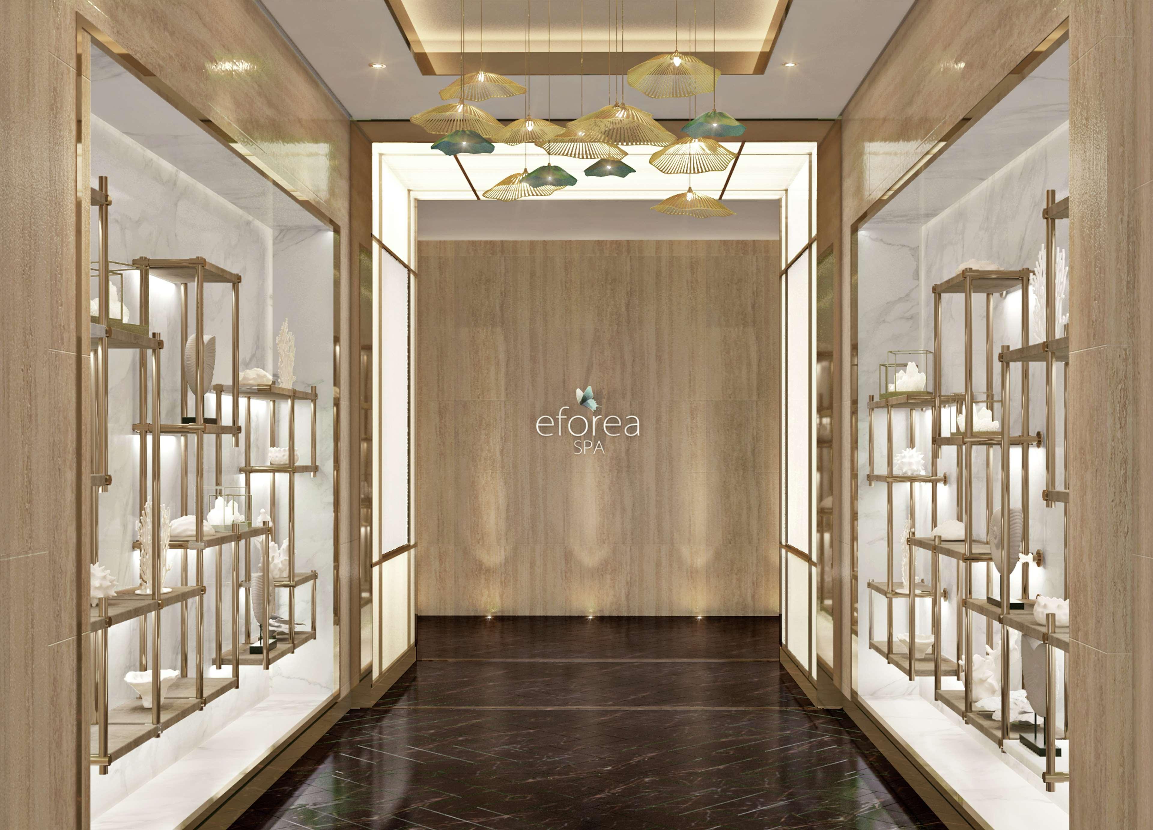 Hotel Hilton Doha The Pearl Esterno foto Entrance of the hotel